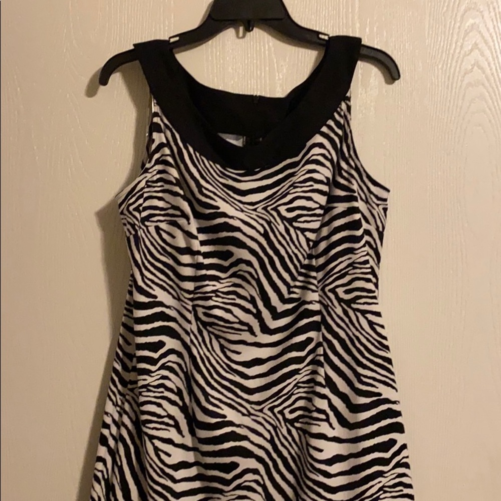 Sleeveless zebra print form fitting dress